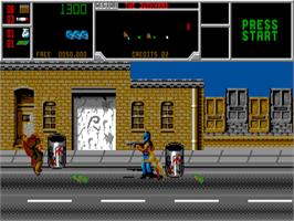 In game image of NARC on the Atari ST.