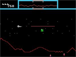 In game image of Defender on the Coleco Vision.