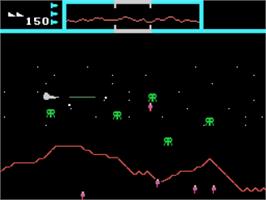 In game image of Defender on the Coleco Vision.