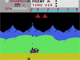 In game image of Moon Patrol on the Coleco Vision.