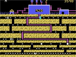 In game image of Oil's Well on the Coleco Vision.