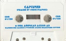 Cartridge artwork for Captured on the Commodore 64.