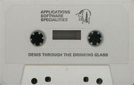 Cartridge artwork for Denis Through the Drinking Glass on the Commodore 64.