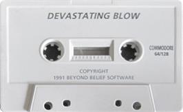 Cartridge artwork for Devastating Blow on the Commodore 64.