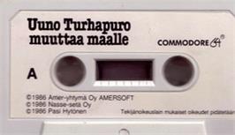 Cartridge artwork for Uuno Turhapuro Muuttaa Maalle on the Commodore 64.