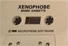 Cartridge artwork for Xenophobe on the Commodore 64.