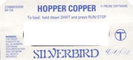 Top of cartridge artwork for Hopper Copper on the Commodore 64.