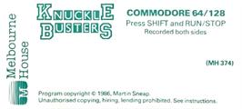Top of cartridge artwork for Knuckle Buster on the Commodore 64.