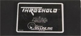 Top of cartridge artwork for Threshold on the Commodore 64.