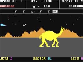 In game image of Advance of the Mega Camels on the Commodore 64.