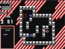 In game image of Atomix on the Commodore 64.