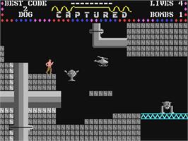 In game image of Captured on the Commodore 64.