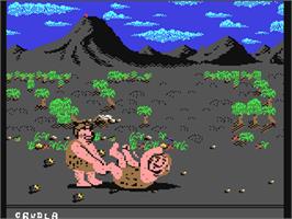 In game image of Caveman Ugh-Lympics on the Commodore 64.