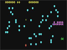 In game image of Centipede on the Commodore 64.