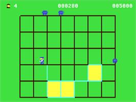 In game image of Cuthbert Goes Walkabout on the Commodore 64.