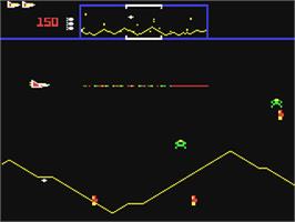 In game image of Defender on the Commodore 64.