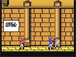 In game image of E-SWAT: Cyber Police on the Commodore 64.