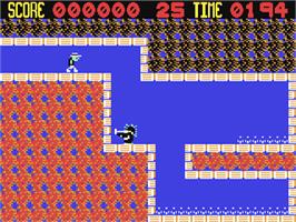 In game image of Fearless Fred And The Factory Of Doom on the Commodore 64.