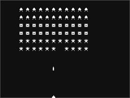In game image of Invaders (64'er - 1984) on the Commodore 64.