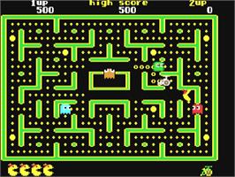 In game image of Jr. Pac-man on the Commodore 64.