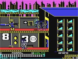 In game image of Judge Dredd (Melbourne House) on the Commodore 64.