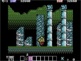 In game image of Karnov on the Commodore 64.