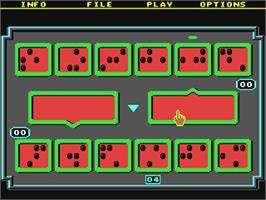 In game image of Mancala (California Dreams) on the Commodore 64.