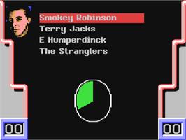In game image of Mike Read's Computer Pop Quiz on the Commodore 64.