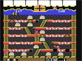 In game image of Mr. Do! on the Commodore 64.
