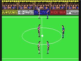 In game image of Peter Beardsley's International Football on the Commodore 64.