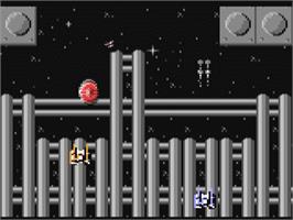 In game image of Space Assassin on the Commodore 64.