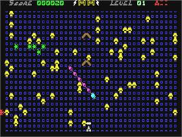 In game image of Spectipede on the Commodore 64.