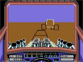 In game image of Stunt Car Racer on the Commodore 64.