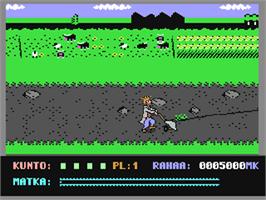 In game image of Uuno Turhapuro Muuttaa Maalle on the Commodore 64.