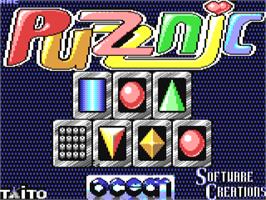 Title screen of Puzznic on the Commodore 64.