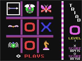 Title screen of Triad on the Commodore 64.