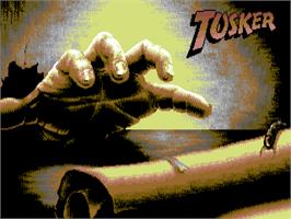 Title screen of Tusker on the Commodore 64.