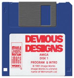 Cartridge artwork for Devious Designs on the Commodore Amiga.
