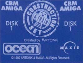 Top of cartridge artwork for A-Train Construction Set on the Commodore Amiga.
