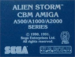 Top of cartridge artwork for Alien Storm on the Commodore Amiga.