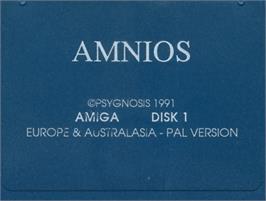 Top of cartridge artwork for Amnios on the Commodore Amiga.
