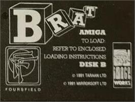 Top of cartridge artwork for Brat on the Commodore Amiga.