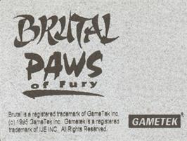 Top of cartridge artwork for Brutal: Paws of Fury on the Commodore Amiga.