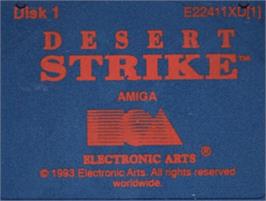 Top of cartridge artwork for Desert Strike - Return To The Gulf on the Commodore Amiga.