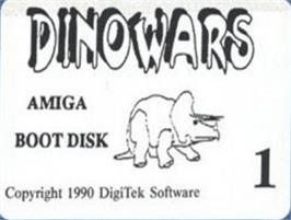 Top of cartridge artwork for Dino Wars on the Commodore Amiga.