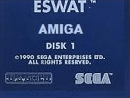 Top of cartridge artwork for ESWAT on the Commodore Amiga.