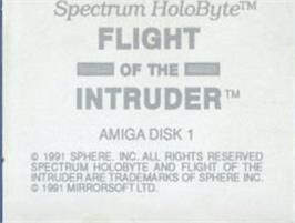 Top of cartridge artwork for Flight of the Intruder on the Commodore Amiga.