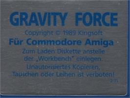 Top of cartridge artwork for Gravity Force on the Commodore Amiga.