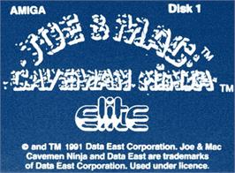 Top of cartridge artwork for Joe And Mac - Caveman Ninja on the Commodore Amiga.