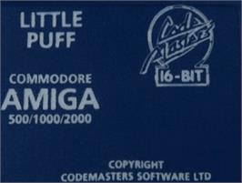 Top of cartridge artwork for Little Puff in Dragonland on the Commodore Amiga.